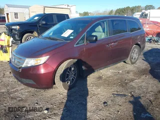 2012 Honda Odyssey EX-L with VIN 5FNRL5H60CB096691, listed as a IAAI auction lot 41824395 with 93,047 mi miles and . Bid and sale history available at DreamBid. Image 17.