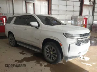 2021 Chevrolet Tahoe LS z VIN 1GNSKMKD2MR226348, wystawiony jako IAAI lot #41332920 z przebiegiem 44 949 mil mil oraz . Historia ofert i sprzedaży dostępna na DreamBid. Obrazek 1.