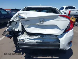 2019 Honda Civic EX z VIN 19XFC1F38KE003716, wystawiony jako IAAI lot #42293611 z przebiegiem 109 882 mil mil oraz . Historia ofert i sprzedaży dostępna na DreamBid. Obrazek 16.