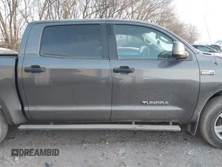 2012 Toyota Tundra 4WD Truck with VIN 5TFDW5F11CX250999, listed as a IAAI auction lot 41087695 with 244,868 mi miles. Bid and sale history available at carsss.com. Image 13.