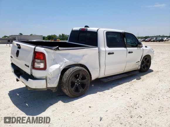 2023 Ram 1500 Big Horn with VIN 1C6SRFFT7PN698730, listed as a Copart auction lot 56967445 with 30,514 mi miles and Salvage title. Bid and sale history available at DreamBid. Image 3.