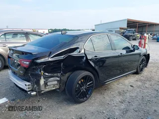 2022 Toyota Camry XSE z VIN 4T1K61AK7NU499890, wystawiony jako IAAI lot #39839639 z przebiegiem 103 043 mil mil oraz . Historia ofert i sprzedaży dostępna na DreamBid. Obrazek 4.