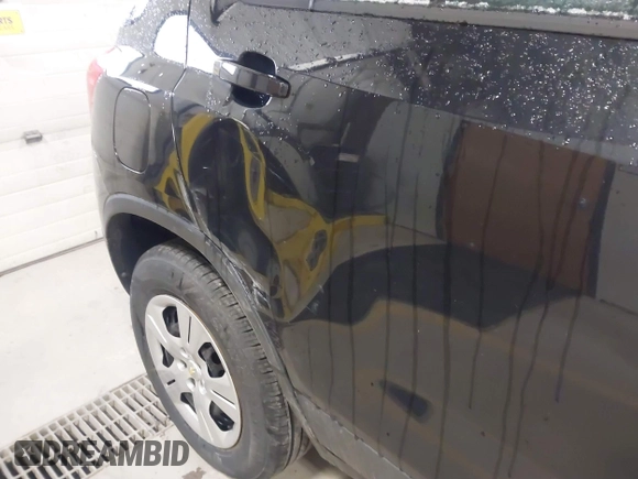 2015 Chevrolet Trax LS with VIN KL7CJKSBXFB126980, listed as a IAAI auction lot 41859980 with 62,483 mi miles. Bid and sale history available at carsss.com. Image 12.