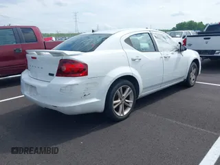 2014 Dodge Avenger SE with VIN 1C3CDZAB5EN189197, listed as a IAAI auction lot 42101613 with Not Provided miles and . Bid and sale history available at DreamBid. Image 4.