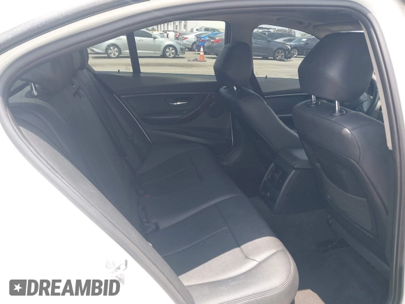 2014 BMW 3 Series 328i with VIN WBA3C1C52EK110753, listed as a IAAI auction lot 42444129 with 169,035 mi miles and . Bid and sale history available at DreamBid. Image 8.