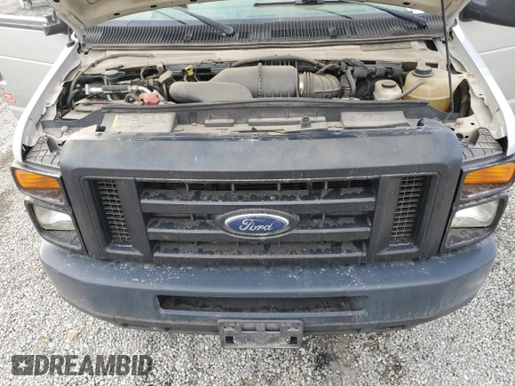 2009 Ford Econoline Passenger XL with VIN 1FBNE31L39DA86660, listed as a Copart auction lot 43724115 with 562,883 mi miles and Salvage title. Bid and sale history available at DreamBid. Image 12.