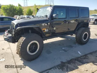 2016 Jeep Wrangler Unlimited Rubicon with VIN 1C4HJWFG3GL155092, listed as a Copart auction lot 62410365 with 82,231 mi miles and Salvage title. Bid and sale history available at DreamBid. Image 1.