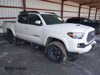 2021 Toyota Tacoma 4WD SR with VIN 3TYCZ5AN4MT048876, listed as a IAAI auction lot 41802975 with 27,816 mi miles. Bid and sale history available at carsss.com. Image 1.