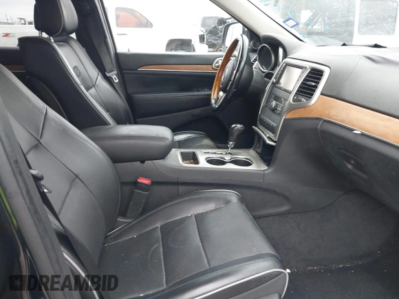 2011 Jeep Grand Cherokee Overland with VIN 1J4RS6GT7BC518123, listed as a IAAI auction lot 41277374 with 163,752 mi miles and . Bid and sale history available at DreamBid. Image 5.