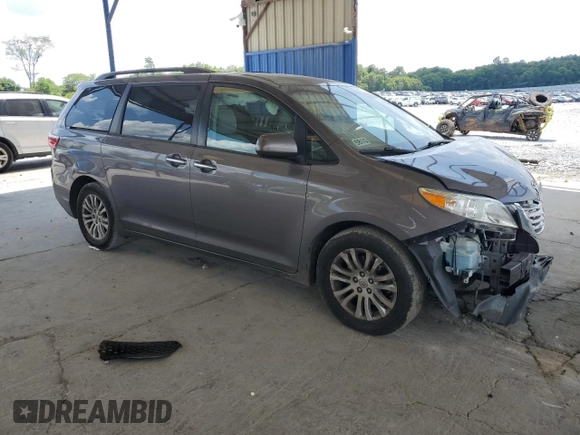 2015 Toyota Sienna XLE с VIN 5TDYK3DC0FS630013, выставлен на аукционе Copart как лот 60044955 с пробегом 124 063 миль миль и Списание • Salvage title. История ставок и продаж доступна на DreamBid. Изображение 4.