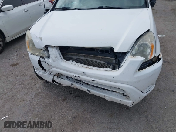 2004 Honda CR-V LX with VIN JHLRD68454C004803, listed as a IAAI auction lot 41910388 with 192,766 mi miles and . Bid and sale history available at carsss.com. Image 6.