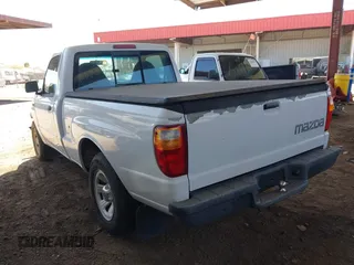 2003 Mazda B-Series Truck SX z VIN 4F4YR12D43TM09711, wystawiony jako IAAI lot #42265629 z przebiegiem 116 319 mil mil oraz . Historia ofert i sprzedaży dostępna na DreamBid. Obrazek 3.