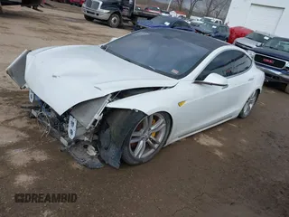 2012 Tesla Model S Performance with VIN 5YJSA1DP4CFP02346, listed as a IAAI auction lot 41642201 with Not Provided miles. Bid and sale history available at carsss.com. Image 2.