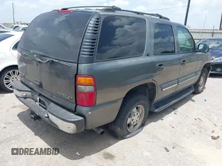 2002 Chevrolet Tahoe LS z VIN 1GNEC13ZX2R135330, wystawiony jako IAAI lot #42526127 z przebiegiem 277 208 mil mil oraz . Historia ofert i sprzedaży dostępna na DreamBid. Obrazek 4.