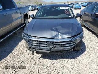2021 Volkswagen Jetta SEL with VIN 3VWE57BU6MM052524, listed as a Copart auction lot 55524055 with 64,748 mi miles and Salvage title. Bid and sale history available at DreamBid. Image 5.