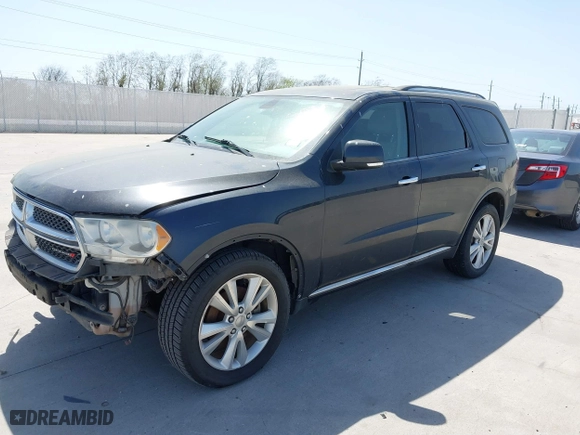 2013 Dodge Durango Crew with VIN 1C4SDHDT5DC637535, listed as a IAAI auction lot 41867982 with 162,569 mi miles. Bid and sale history available at carsss.com. Image 17.