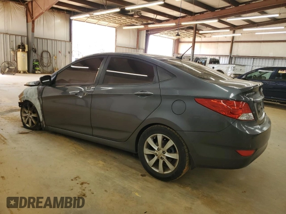 2012 Hyundai Accent GLS z VIN KMHCU4AE0CU225272, wystawiony jako Copart lot #49724155 z przebiegiem Nie podano mil oraz Szkoda całkowita • Salvage title. Historia ofert i sprzedaży dostępna na DreamBid. Obrazek 2.