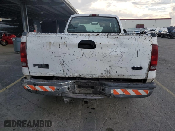 2002 Ford F-250 XL with VIN 1FTNX20F22ED31685, listed as a Copart auction lot 83911384 with 276,778 mi miles and Salvage title. Bid and sale history available at DreamBid. Image 6.