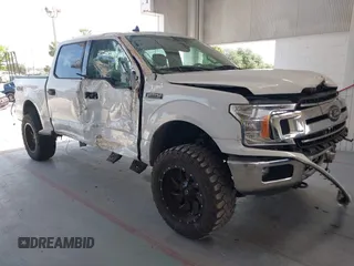 2019 Ford F-150 XL with VIN 1FTEW1E55KFB69767, listed as a IAAI auction lot 42326370 with 143,523 mi miles and . Bid and sale history available at DreamBid. Image 1.