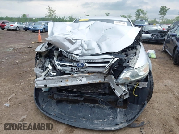 2012 Ford Taurus SEL z VIN 1FAHP2EW1CG132855, wystawiony jako IAAI lot #42256022 z przebiegiem 177 749 mil mil oraz . Historia ofert i sprzedaży dostępna na DreamBid. Obrazek 12.
