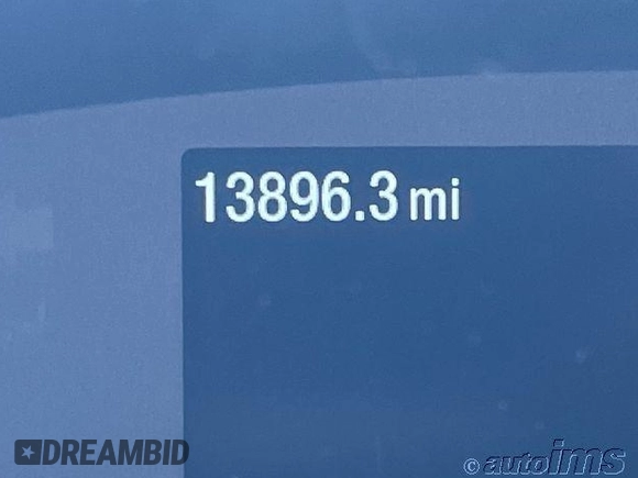 2023 Ford Transit Cargo z VIN 1FTBR1X82PKC09240, wystawiony jako IAAI lot #42818716 z przebiegiem 13 896 mil mil oraz . Historia ofert i sprzedaży dostępna na DreamBid. Obrazek 2.
