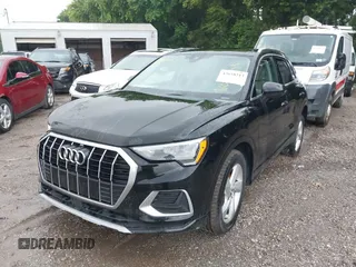 2019 Audi Q3 Premium with VIN WA1AECF34K1077471, listed as a IAAI auction lot 42658213 with 125,889 mi miles and . Bid and sale history available at DreamBid. Image 2.