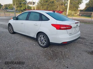 2016 Ford Focus SE z VIN 1FADP3F22GL355984, wystawiony jako IAAI lot #42564516 z przebiegiem 128 002 mil mil oraz . Historia ofert i sprzedaży dostępna na DreamBid. Obrazek 3.