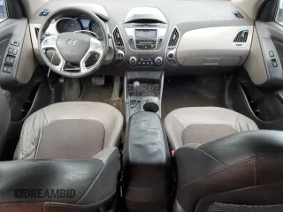 2010 Hyundai Tucson GLS with VIN KM8JU3AC9AU113714, listed as a Copart auction lot 55263765 with 193,175 mi miles and Salvage Title. Bid and sale history available at DreamBid. Image 8.