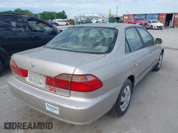 1999 Honda Accord LX with VIN JHMCG5642XC003361, listed as a IAAI auction lot 42270009 with 160,706 mi miles and . Bid and sale history available at DreamBid. Image 4.