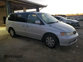2004 Honda Odyssey EX-L with VIN 5FNRL189X4B007746, listed as a Copart auction lot 47399895 with 196,416 mi miles and Clean Title. Bid and sale history available at DreamBid. Image 4.