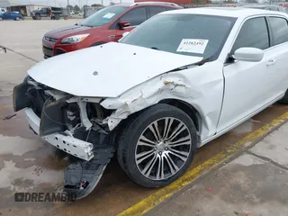 2013 Chrysler 300 with VIN 2C3CCABGXDH735739, listed as a IAAI auction lot 41282492 with 121,487 mi miles. Bid and sale history available at carsss.com. Image 6.