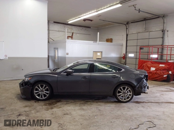2017 Mazda Mazda6 Touring with VIN JM1GL1V57H1112266, listed as a IAAI auction lot 41553530 with 46,599 mi miles. Bid and sale history available at carsss.com. Image 15.
