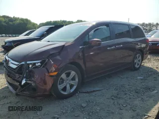 2019 Honda Odyssey EX-L z VIN 5FNRL6H77KB090836, wystawiony jako Copart lot #59514165 z przebiegiem Nie podano mil oraz Szkoda całkowita • Salvage title. Historia ofert i sprzedaży dostępna na DreamBid. Obrazek 1.
