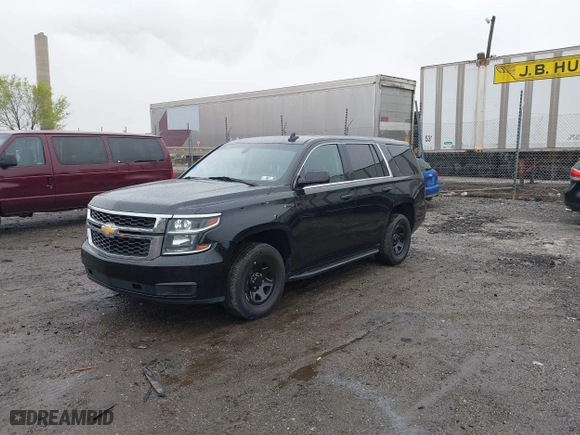 2015 Chevrolet Tahoe Commercial with VIN 1GNSK2EC8FR570602, listed as a IAAI auction lot 41977021 with 115,866 mi miles. Bid and sale history available at carsss.com. Image 6.