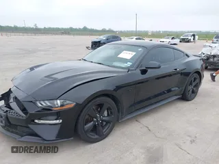2021 Ford Mustang GT z VIN 1FA6P8CF2M5149691, wystawiony jako IAAI lot #41937878 z przebiegiem 57 865 mil mil oraz . Historia ofert i sprzedaży dostępna na DreamBid. Obrazek 17.