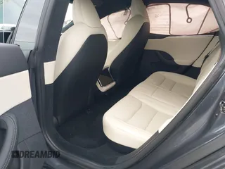 2021 Tesla Model S Long Range с VIN 5YJSA1E57MF441387, выставлен на аукционе IAAI как лот 42034307 с пробегом Не указан миль и . История ставок и продаж доступна на DreamBid. Изображение 8.