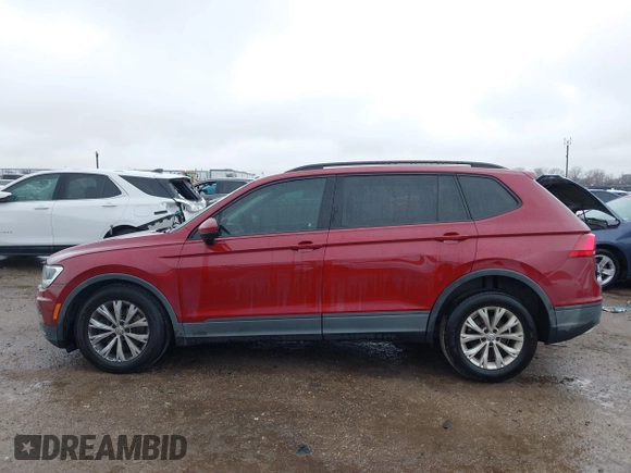2018 Volkswagen Tiguan S with VIN 3VV1B7AX8JM124827, listed as a IAAI auction lot 41544321 with 101,492 mi miles and . Bid and sale history available at DreamBid. Image 14.