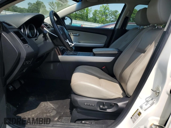 2015 Mazda CX-9 Grand Touring z VIN JM3TB2DA3F0452160, wystawiony jako Copart lot #60220655 z przebiegiem 145 185 mil mil oraz Szkoda całkowita • Salvage title. Historia ofert i sprzedaży dostępna na DreamBid. Obrazek 7.