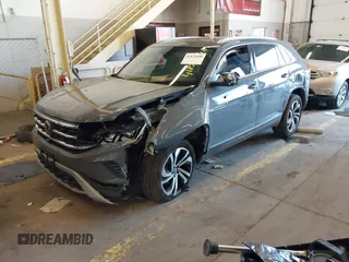 2021 Volkswagen Atlas SEL Premium with VIN 1V2TE2CA8MC207933, listed as a IAAI auction lot 41823640 with 64,425 mi miles and . Bid and sale history available at DreamBid. Image 2.