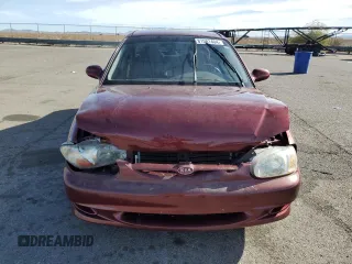 2001 Kia Sephia z VIN KNAFB121015028494, wystawiony jako Copart lot #81581404 z przebiegiem 86 655 mil mil oraz Szkody całkowita. Historia ofert i sprzedaży dostępna na DreamBid. Obrazek 5.
