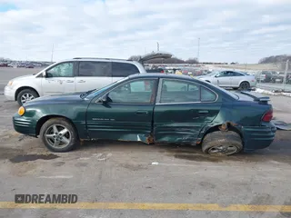 2002 Pontiac Grand Am SE1 with VIN 1G2NF52FX2C165546, listed as a IAAI auction lot 41290065 with 149,834 mi miles. Bid and sale history available at carsss.com. Image 13.