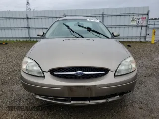2003 Ford Taurus SE Standard with VIN 1FAFP53U03A252904, listed as a Copart auction lot 82175794 with 156,490 mi miles and Salvage Title. Bid and sale history available at carsss.com. Image 5.