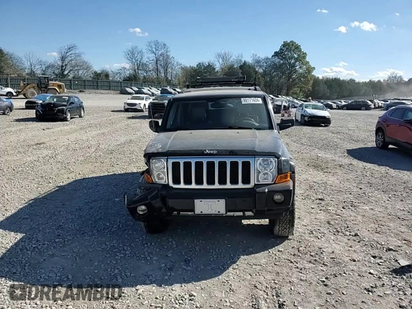 2007 Jeep Commander Overland with VIN 1J8HG68207C610814, listed as a Copart auction lot 41726555 with 211,502 mi miles and Salvage title. Bid and sale history available at DreamBid. Image 12.