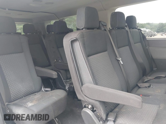 2020 Ford Transit Passenger XL with VIN 1FBAX2Y87LKA09619, listed as a IAAI auction lot 42743359 with 79,822 mi miles and . Bid and sale history available at DreamBid. Image 8.