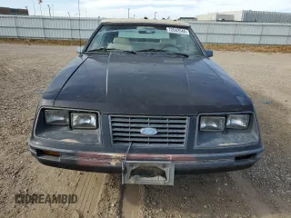 1983 Ford Mustang z VIN 1FABP2731DF221003, wystawiony jako Copart lot #72043544 z przebiegiem 20 777 mil mil oraz Szkoda całkowita • Salvage title. Historia ofert i sprzedaży dostępna na DreamBid. Obrazek 5.