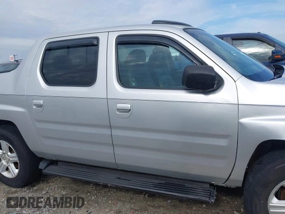 2009 Honda Ridgeline RTL with VIN 2HJYK16539H500986, listed as a IAAI auction lot 42084176 with 161,142 mi miles and . Bid and sale history available at DreamBid. Image 13.