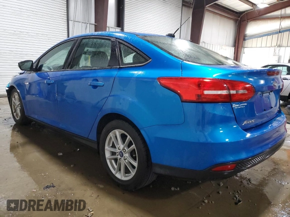 2015 Ford Focus SE with VIN 1FADP3F28FL237744, listed as a Copart auction lot 62307855 with 164,794 mi miles and Salvage title. Bid and sale history available at DreamBid. Image 2.