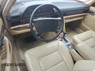 1989 Mercedes-Benz 560 with VIN WDBCA39E1KA479955, listed as a Copart auction lot 76202804 with 132,546 mi miles and Salvage Title. Bid and sale history available at DreamBid. Image 8.