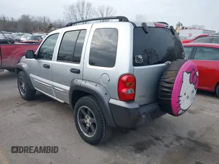 2003 Jeep Liberty Sport with VIN 1J4GL48K03W719229, listed as a IAAI auction lot 41130590 with 261,650 mi miles. Bid and sale history available at carsss.com. Image 3.