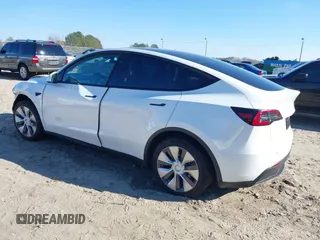 2023 Tesla Model Y Long Range with VIN 7SAYGAEE1PF828338, listed as a IAAI auction lot 40978725 with Not Provided miles and . Bid and sale history available at DreamBid. Image 3.